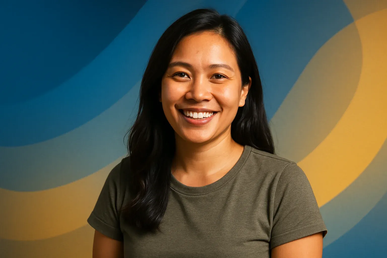 Smiling Filipino woman portrait on abstract blue and gold gradient background